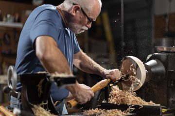 Doug carving wood out of a Sycamore Bowl
